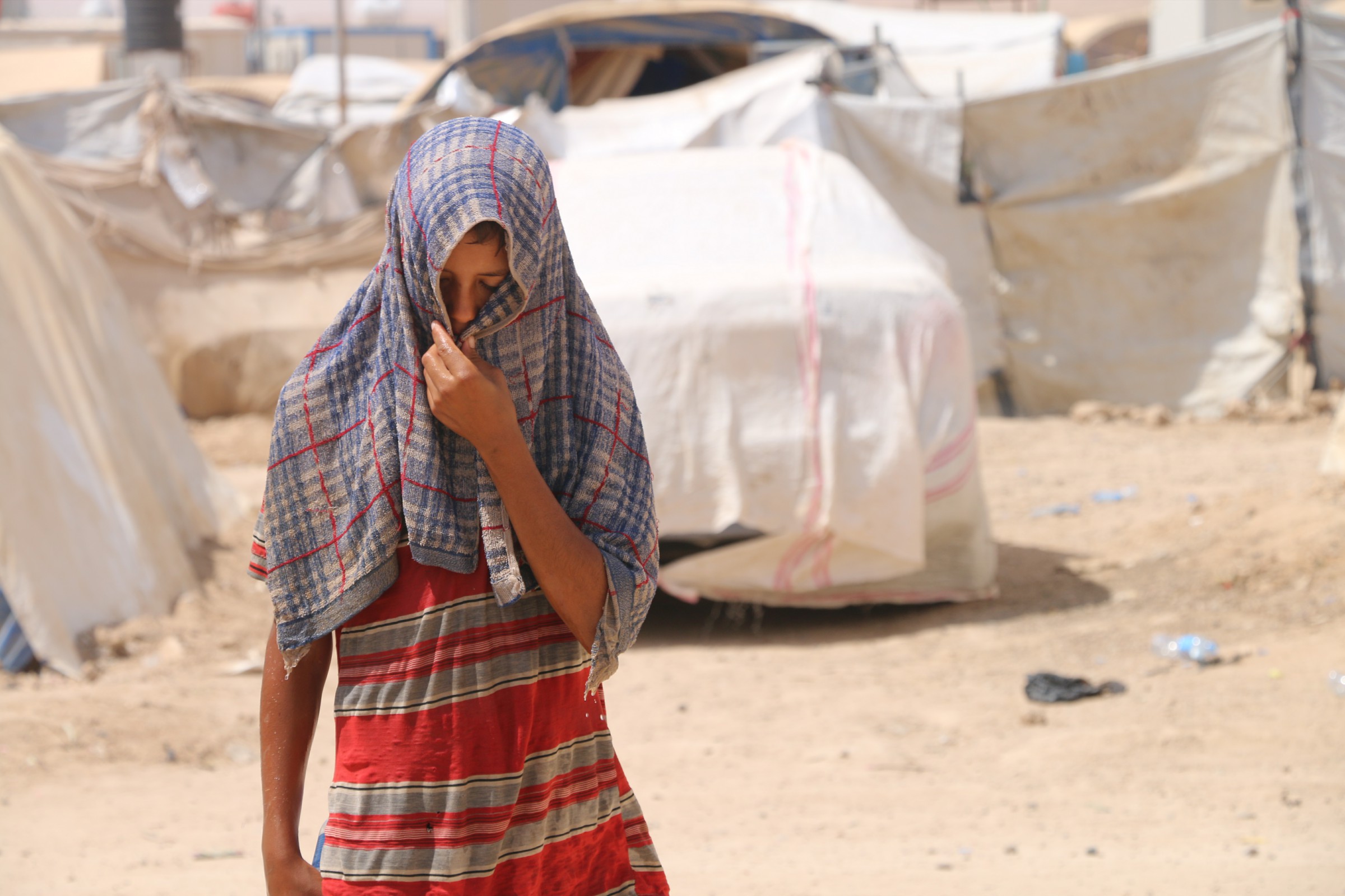 اغلاق مخيم “الـ60 كيلو” غرب الرمادي ونقل النازحين الى مخيم آخر